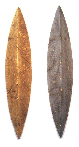 shield forms with gold leaf