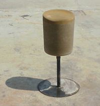 concrete and steel stool