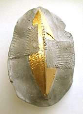 gold leaf and concrete pin